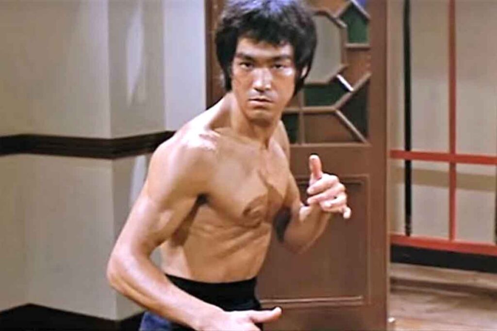 Bruce Lee sir during fight position in bruce lee diet plan article