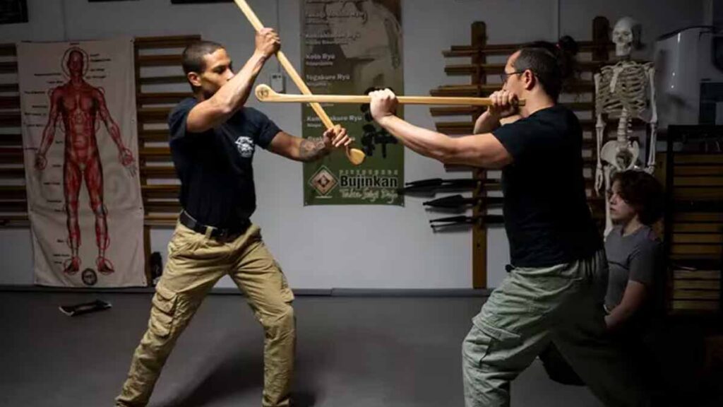 Kevin Martin on the left and Chris Tsu-Raun on the right engage in practice during a Combat Irish Shillelagh Fighting class